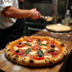 A Basement Slice chef preparing the signature Kyiv Special Pizza using imported Ukrainian wheat flour