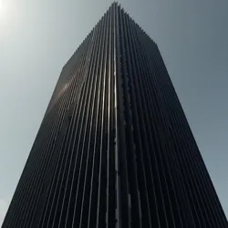 The Obsidian Tower in New Thaumatopolis, featuring extensive use of Shadowmatte in its facade design